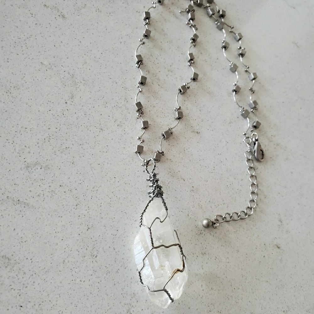 Clear crystal wrapped necklace.